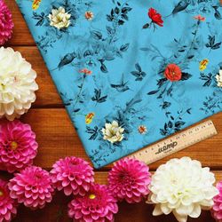 Ткань флис монохромные цветы на голубом