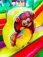 Коммерческий надувной батут "Джунгли" с горкой, 9*6*4.5 м