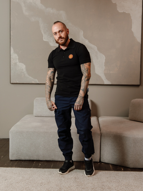 Black polo shirt "Sullen sun"