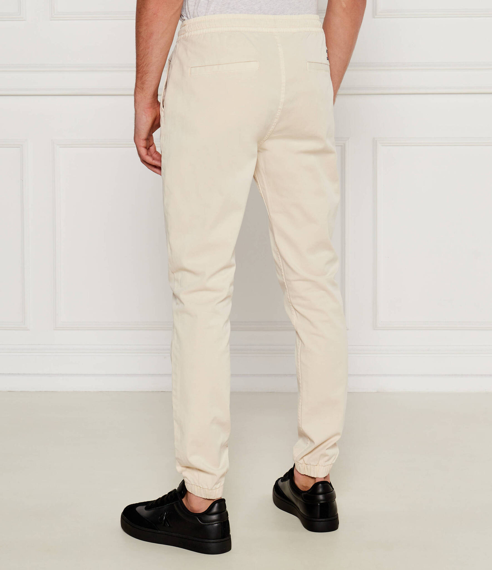 Джогеры TJM AUSTIN Tommy Jeans - кремовый(DM0DM20456)