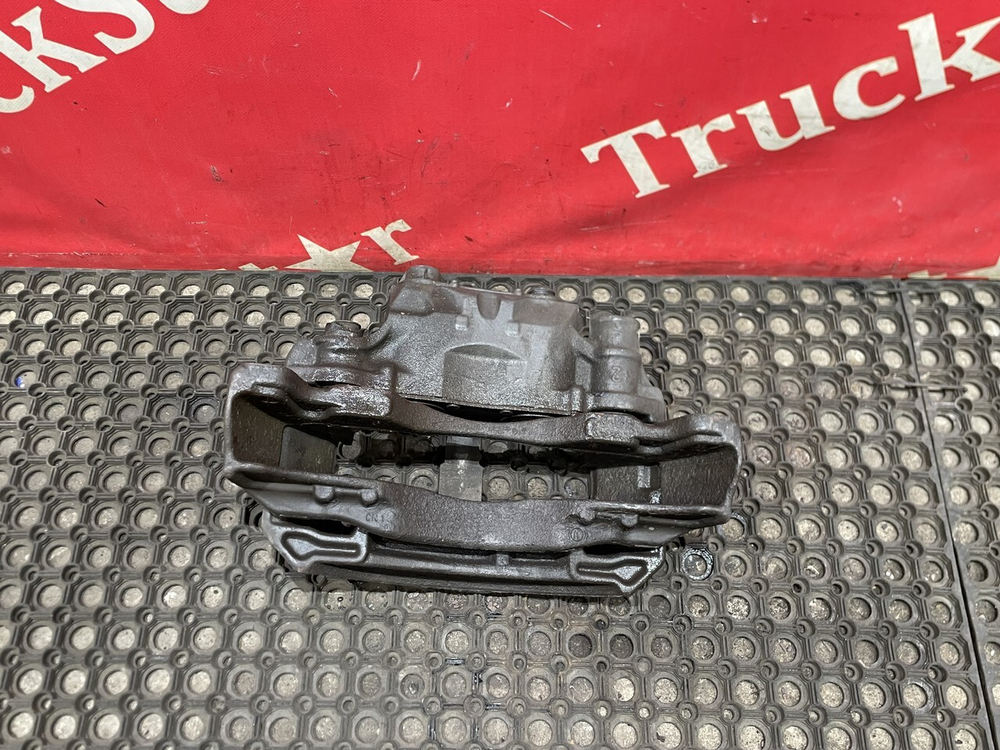 Суппорт передний левый