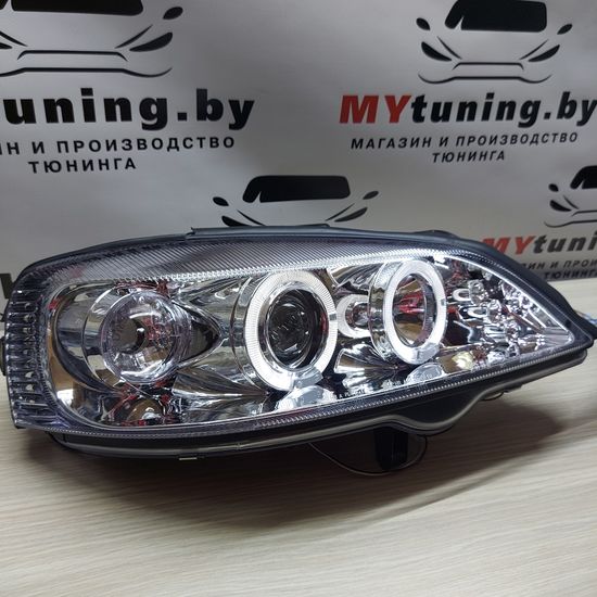 Передние фары Opel Astra G angel eyes chrome
