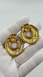 Серьги в стиле door knocker