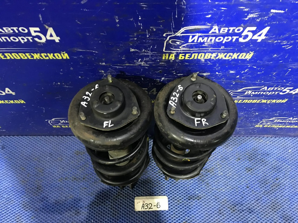 Стойка передняя левая NISSAN CEFIRO 1994