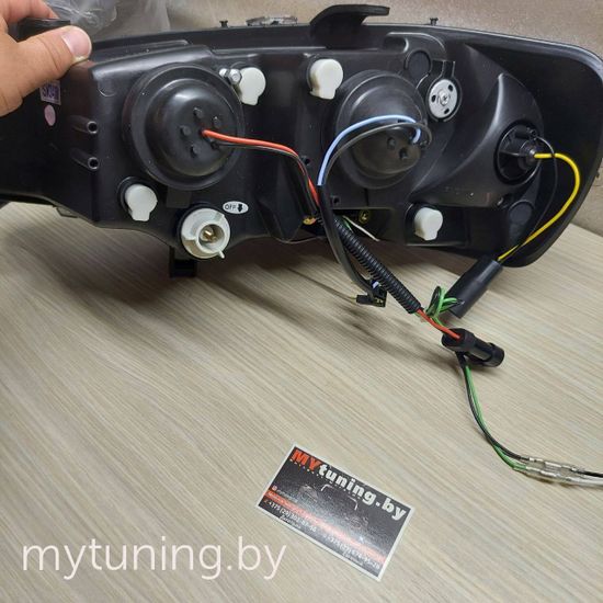 Передние фары Opel Astra G daylight black