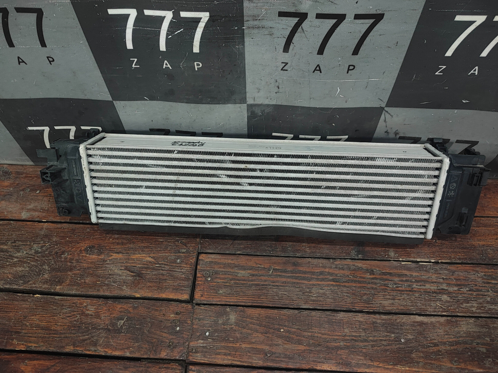 Интеркулер Geely Tugella 19-нв Б/У Оригинал 2074089900