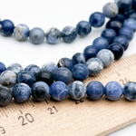 Содалит бусины, диаметр около 6,4-6,6 мм, цена за 29-30 шт (1/2 нити)