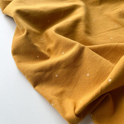 Фланель Редкий горошек на горчичном фоне