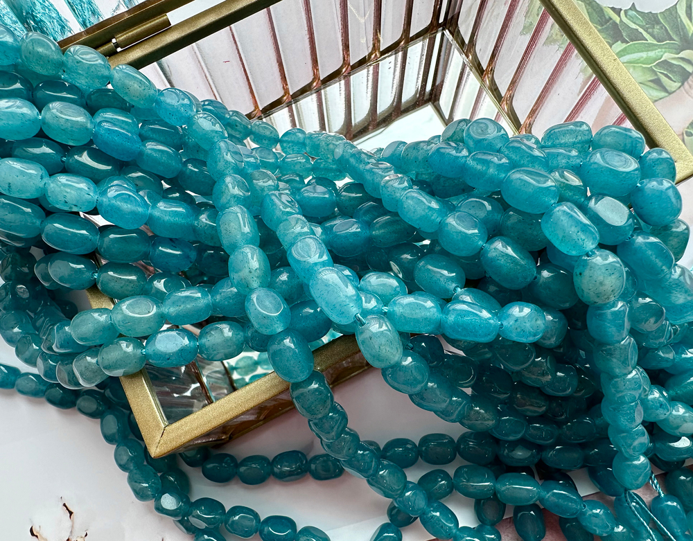 Нить бусин из тонированного кварца 7-8мм (галтовка)