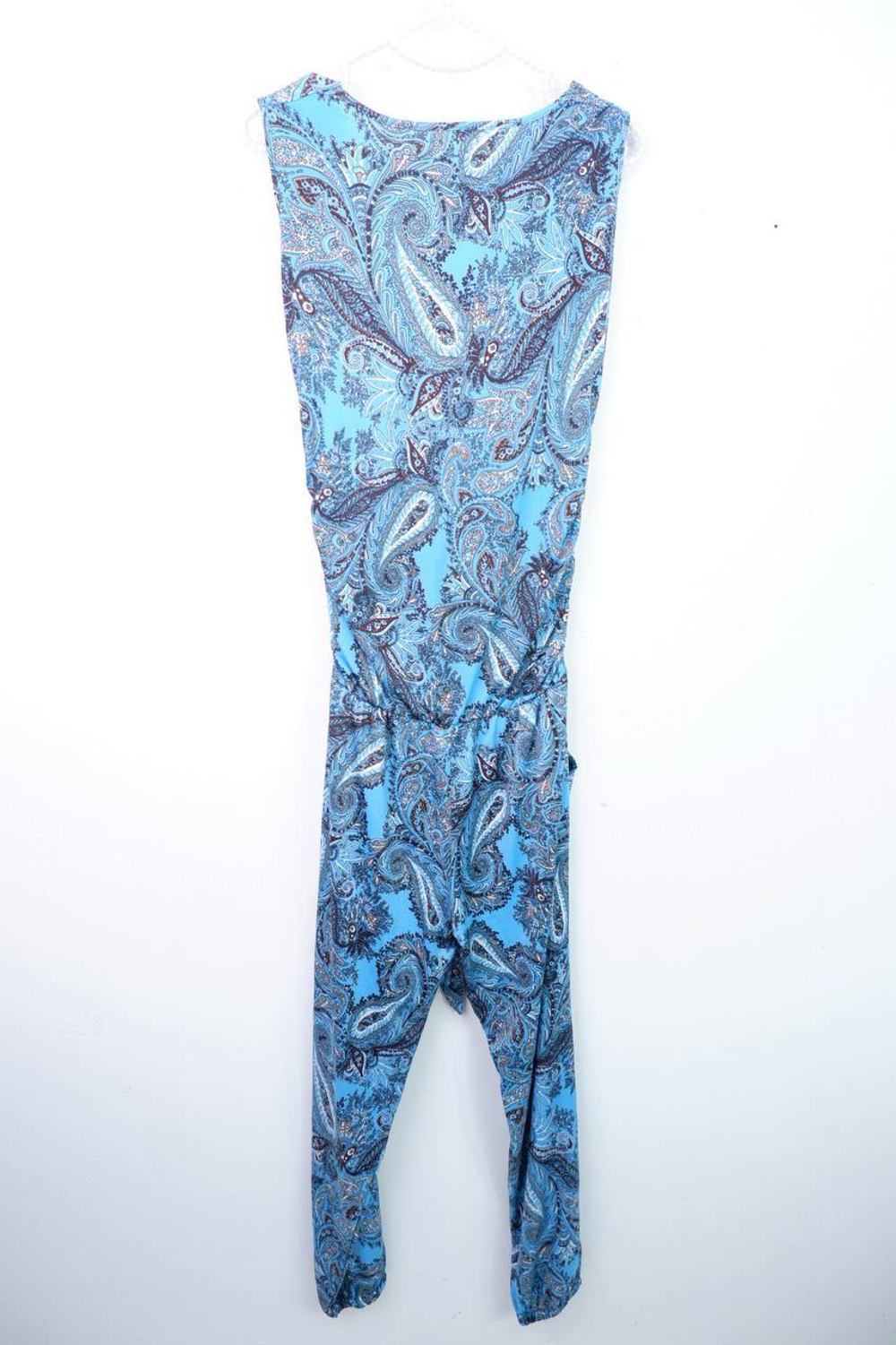 Комбинезон пестрый, визуально на 44 размер