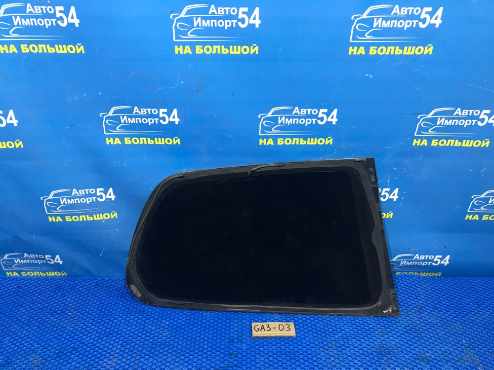 Стекло багажника левое Honda LOGO 2000