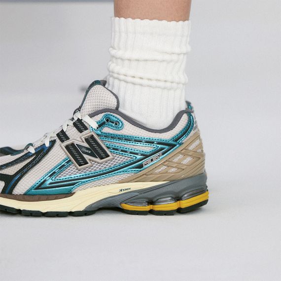 New Balance NB 1906R Беговые кроссовки Низкие Бежево-циан Унисекс