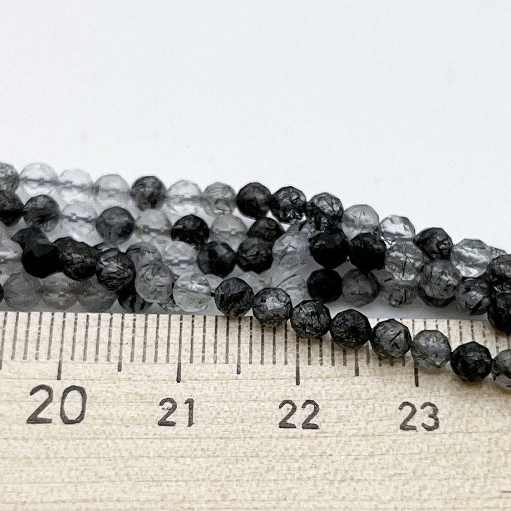 Кварц с шерлом граненый, диаметр 3,3-3,5 мм, цена за 65-66 шт (1/2 нити)