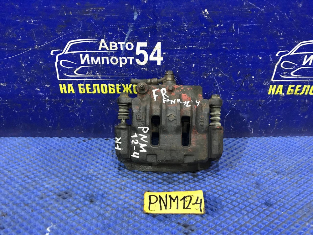 Суппорт тормозной передний правый NISSAN LIBERTY 1998