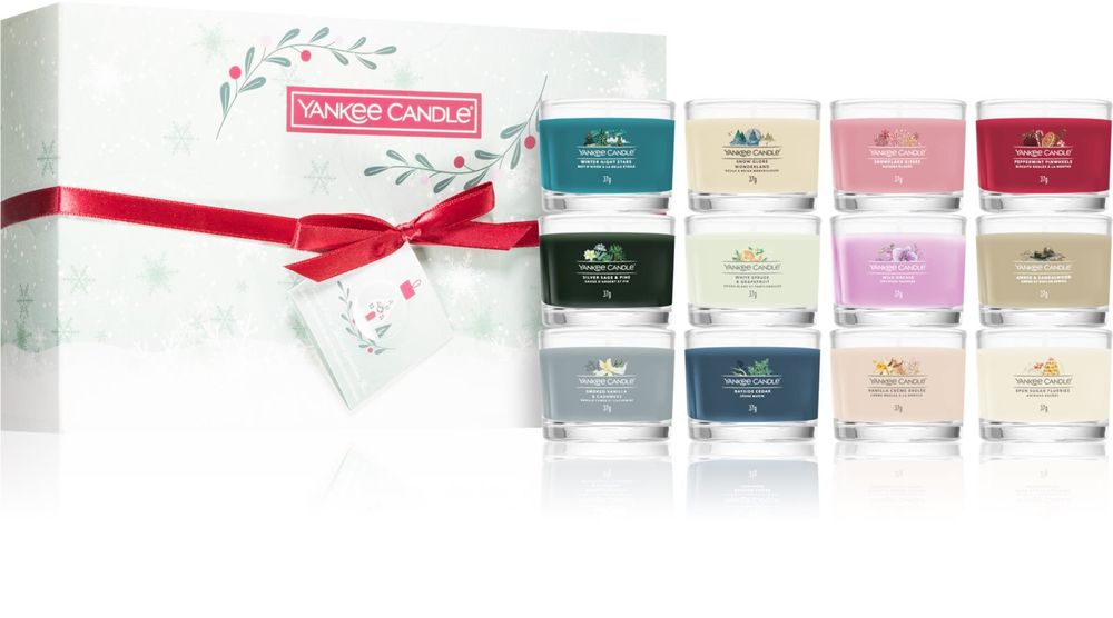 Yankee Candle votive candle 12x37 g + Winter Night Stars + Snow Globe Wonderland + Snowflake Kisses + Peppermint Pinwheels + Silver Sage &amp; Pine + White Spruce &amp; Grapefruit + Wild Orchid + Amber &amp; Sandalwood + Smoked Vanilla &amp; Cashmere + Bayside Cedar + Vanilla Creme Brulee + Spun Sugar Flurries Snow Globe Wonderland 12 Mini Votives Candles