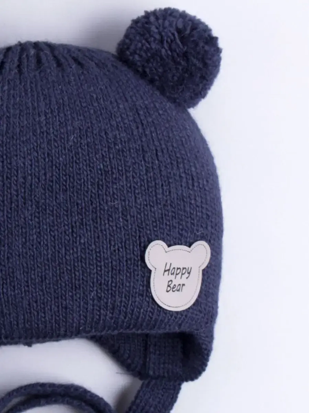 Шапка детская осенняя с завязками и помпонами