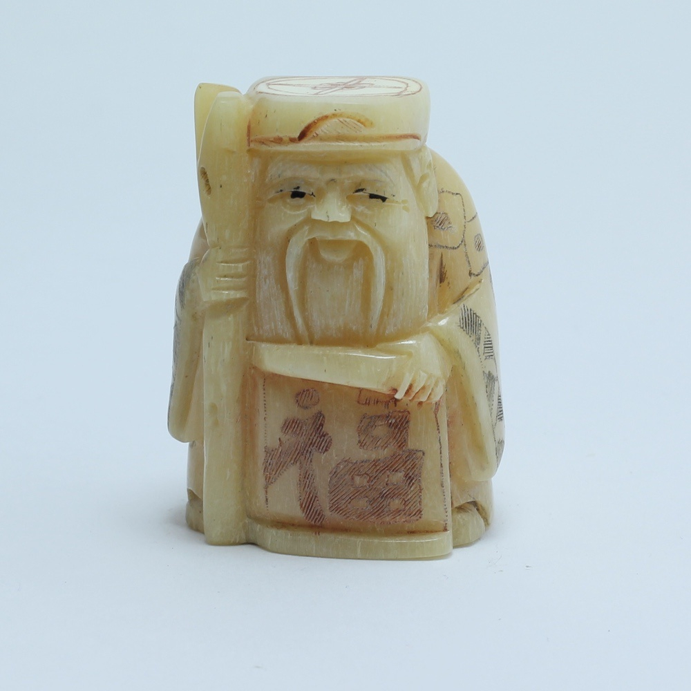 Нэцкэ Дзюродзин с посохом и иероглифом счастья и благополучия