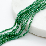 Фианит (кубический цирконий), цвет изумрудный, размер 2 мм, цена за нить около 130 шт (38 см)