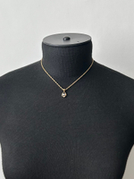 Миниатюрный кулон Nina Ricci