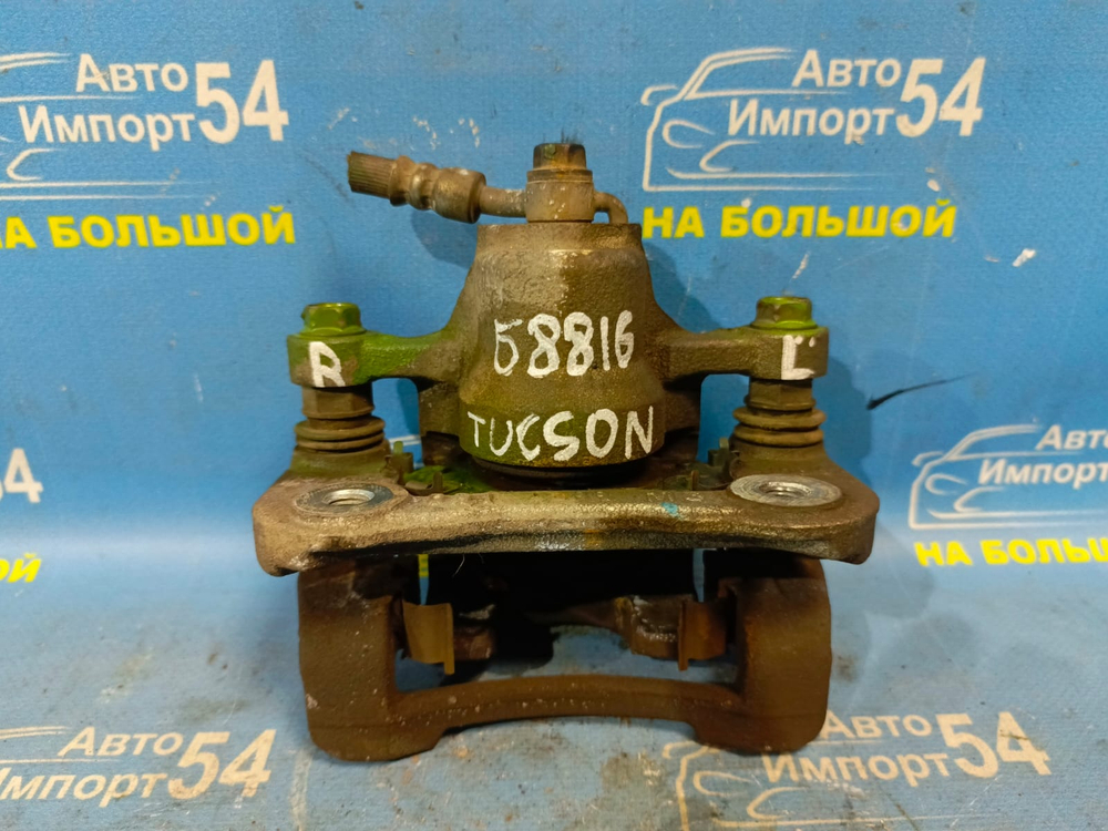 Суппорт тормозной задний левый HYUNDAI TUCSON 2009-2013