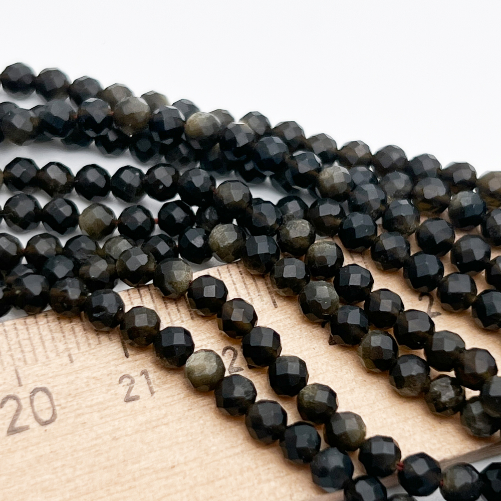 Обсидиан "Золотой" граненый бусины, диаметр около 3,8 мм, цена за отрезок 19 см (1/2 нити)