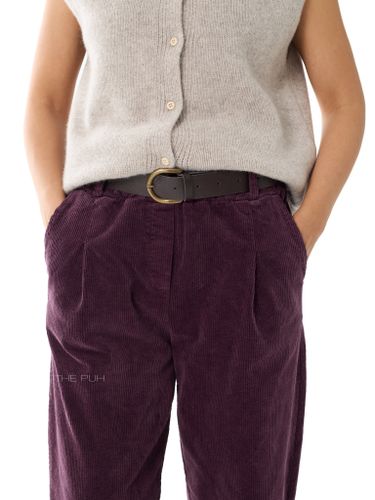 Фиолетовые вельветовые брюки