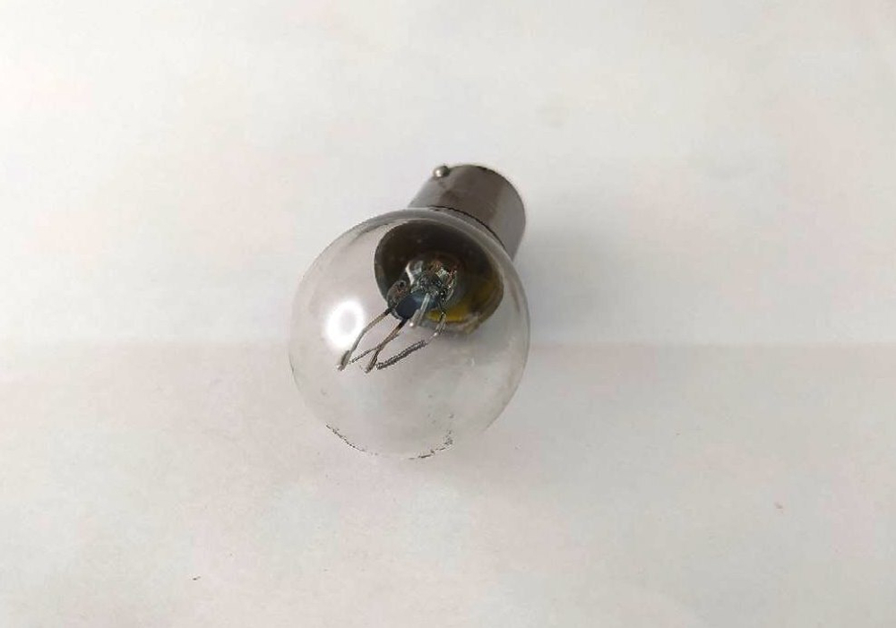 Лампа 2-х контактная (металлический цоколь) P21/5W 12V  TESLAFT  арт. 142943 1 штука