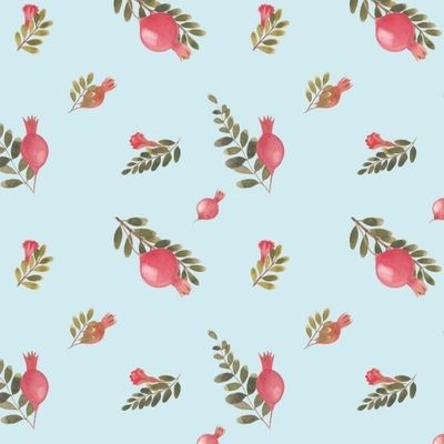 Паттерн с гранатами на голубом фоне