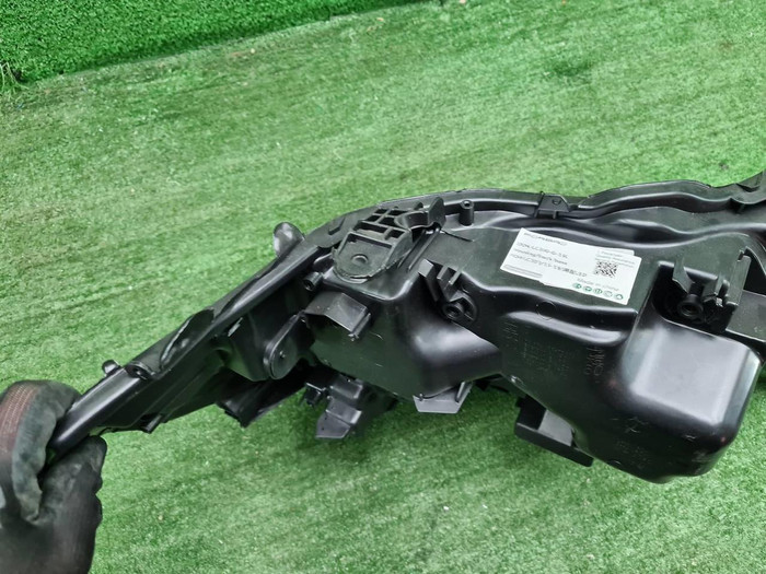 Корпус фары левый Toyota Land Cruiser 200 (15-21)