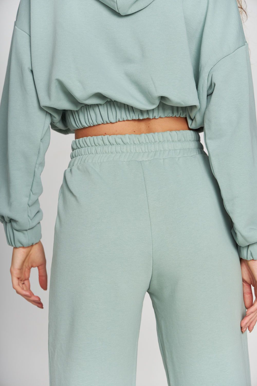 Брюки клеш из футера в цвете холодная мята