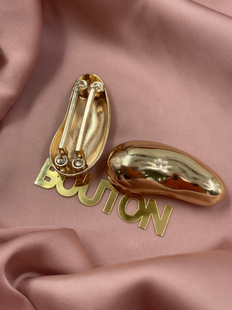 Пряжка-брошь неровной формы для купальника золотистая