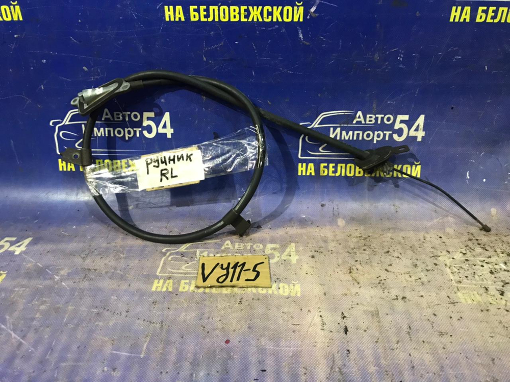 Трос ручника левый NISSAN AD 2000