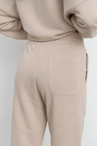 Свободные джоггеры без начеса из премиум футера серо-бежевого цвета