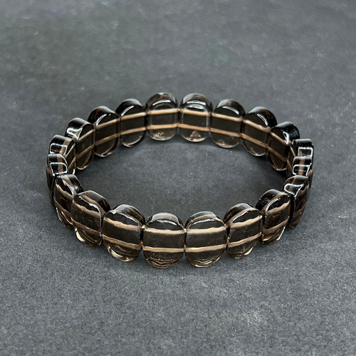 Браслет на резинке Дымчатый кварц (Раухтопаз), из бусин 14х8 мм, 18 см