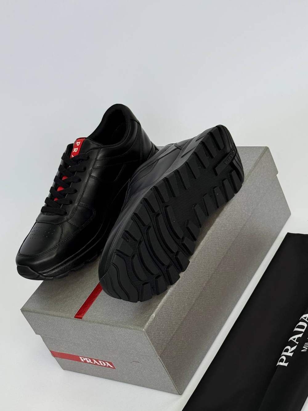 Кроссовки Prada