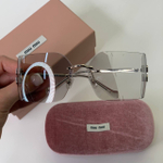 Солнцезащитные очки MIU MIU