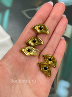 Пуговицы золотистые в форме глаза Скиапар.