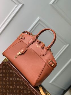 Louis Vuitton Lock It MM Bag