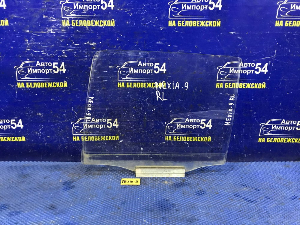 Стекло двери задней левой DAEWOO NEXIA 2011