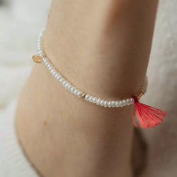 браслет из белого жемчуга с золотом