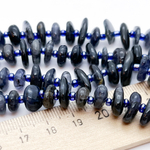 Иолит бусины (кордиерит), галтовка, размер около 9-13*2-4,5 мм, цена за отрезок 19 см (1/2 нити)