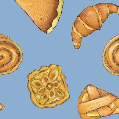Выпечка на синем Булочки аппетитные Пироги и круассаны