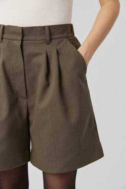 Шорты со складками коричневого цвета