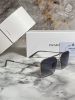 Солнечные очки Prada