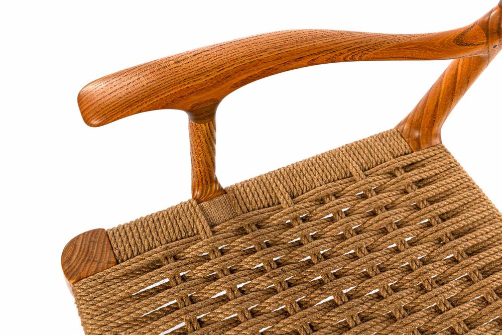 Дизайнерское кресло ручной работы с плетеным сиденьем