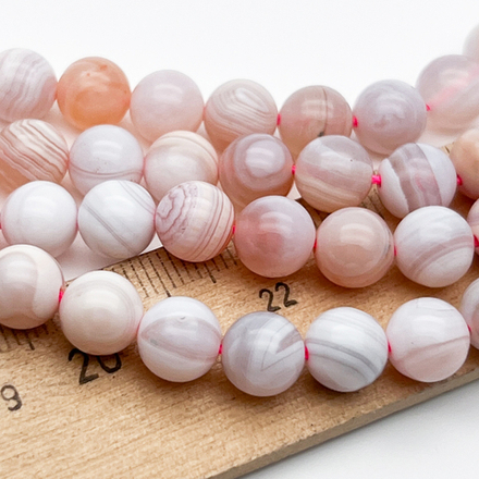 Агат тонированный розовый бусины, диаметр около 8,1-8,3 мм, цена за 12 шт (1/4 нити)