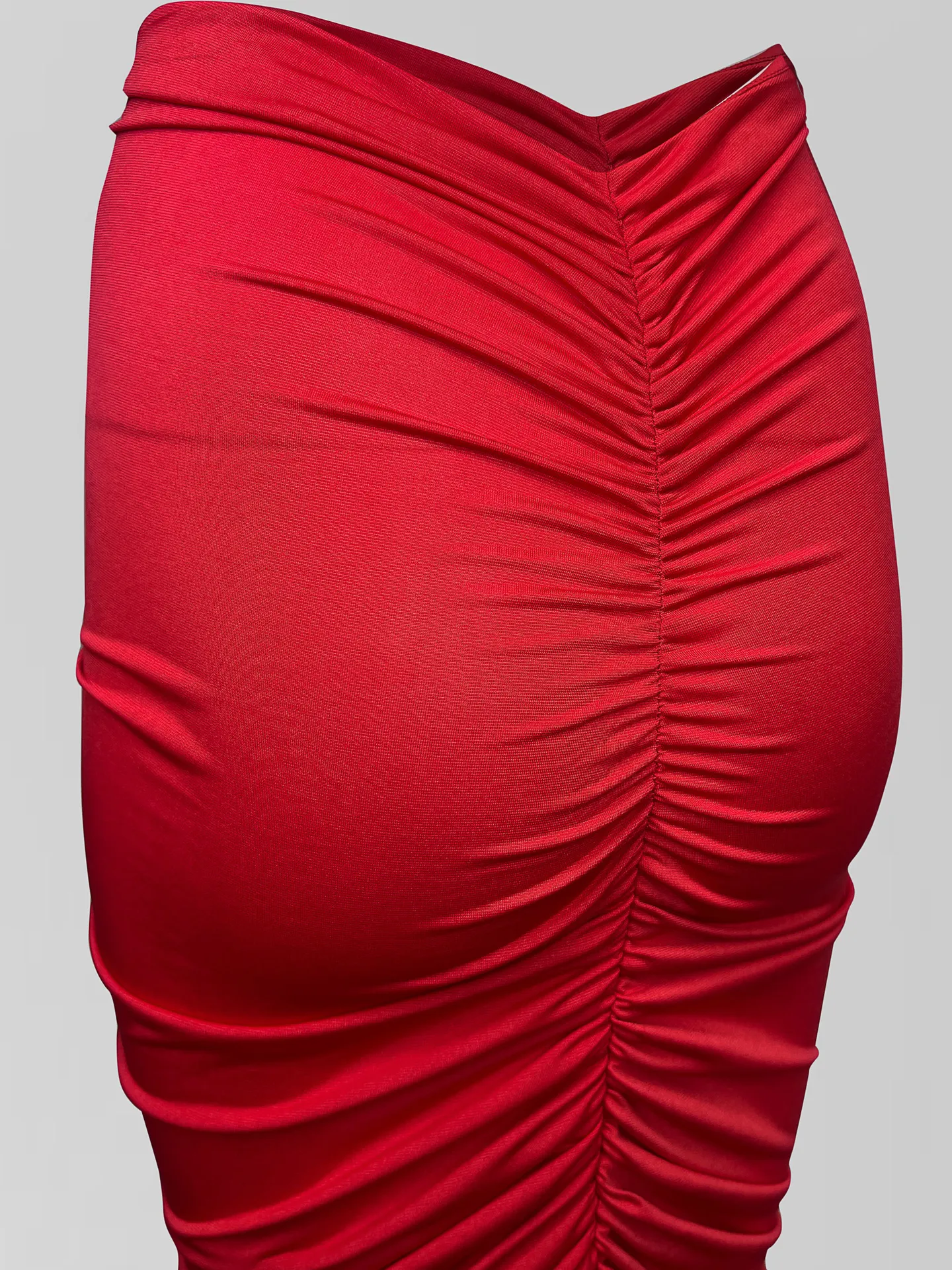 Костюм Dzhadagaevs 20112 из удлиненной юбки и топа с драпировкой