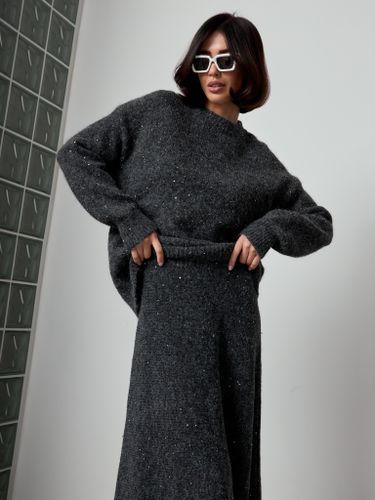 Трикотажный костюм с юбкой темно-серого цвета