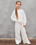 Костюм для девочки из футера с широкими штанами Apres School молочный