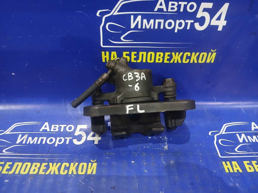 Суппорт тормозной передний левый MITSUBISHI LANCER 1993